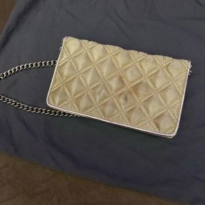 Marc Jacobs gold wallet on chain